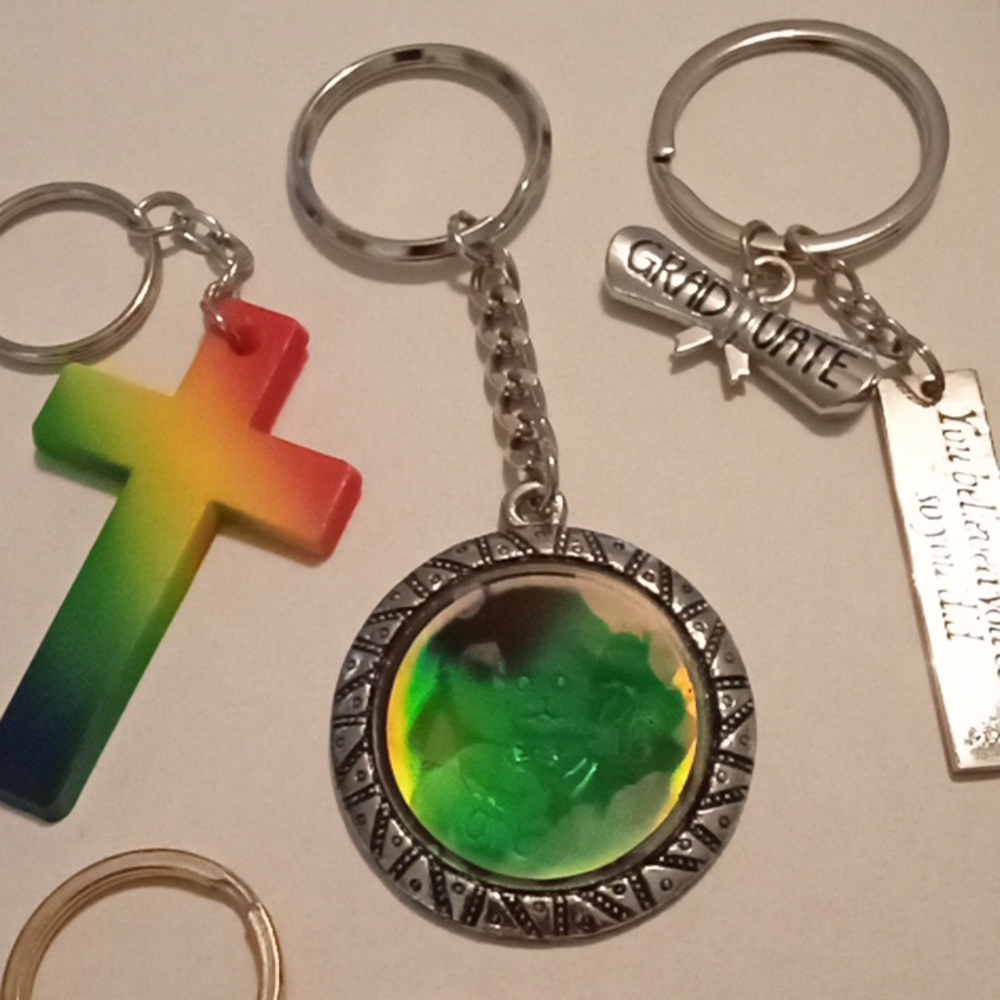 #697.  7 Piece Assorted Keychain Bundle - Picture 7 of 8